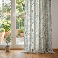 Light blue meadow flower curtain at glass patio doors