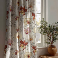 Light red orchid floral curtain beside a potted olive tree