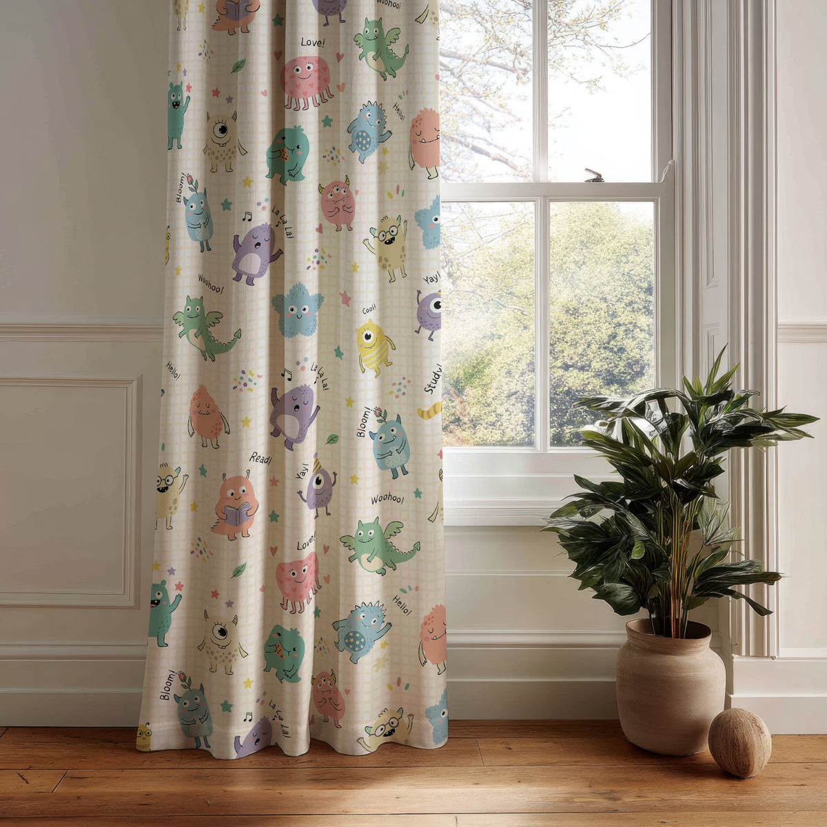 Little monsters kids curtain panel hanging by a white window