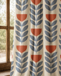 Pair of mid century tulip print curtains at an arched window