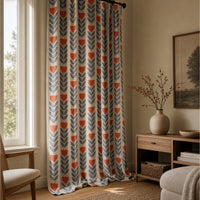 Mid century modern curtain with blue leaves and red tulips on a black rod