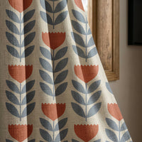 Mid century tulip curtain panel beside a wooden window