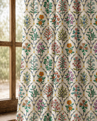 Pair of mughal flower block print curtains at an arched window