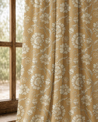 Pair of mustard floral damask curtains at an arched window