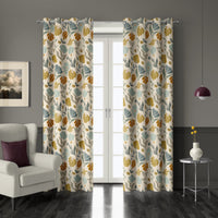 Pair of mustard and sage boho botanical grommet curtains at French doors