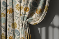 Mustard and sage botanical curtain gathered to one side