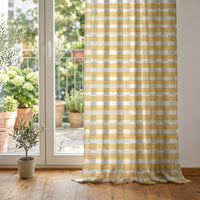 Mustard yellow check curtain at glass patio doors