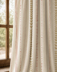 Pair of natural folk ticking stripe curtains at an arched window