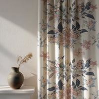 Soft daylight through a navy and blush floral curtain