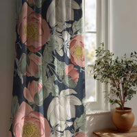 Navy large peony floral curtain beside a potted olive tree