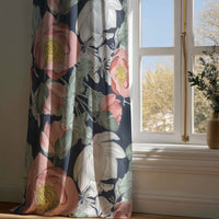 Full-length navy large peony floral curtain draping to a wooden floor