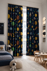 Navy outer space kids curtains in a child's bedroom