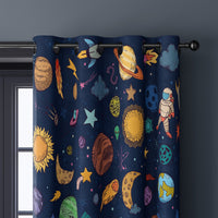 Close-up of navy outer space kids curtain grommets on a black rod