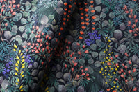 Navy wildflower meadow curtains in a bedroom