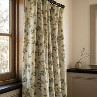 Olive leaf sprig curtains in a warm living room