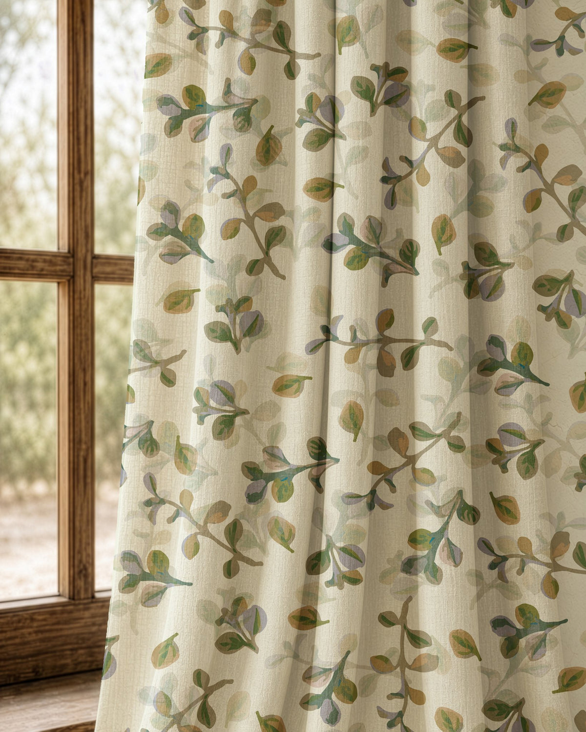 Pair of olive leaf sprig curtains at an arched window