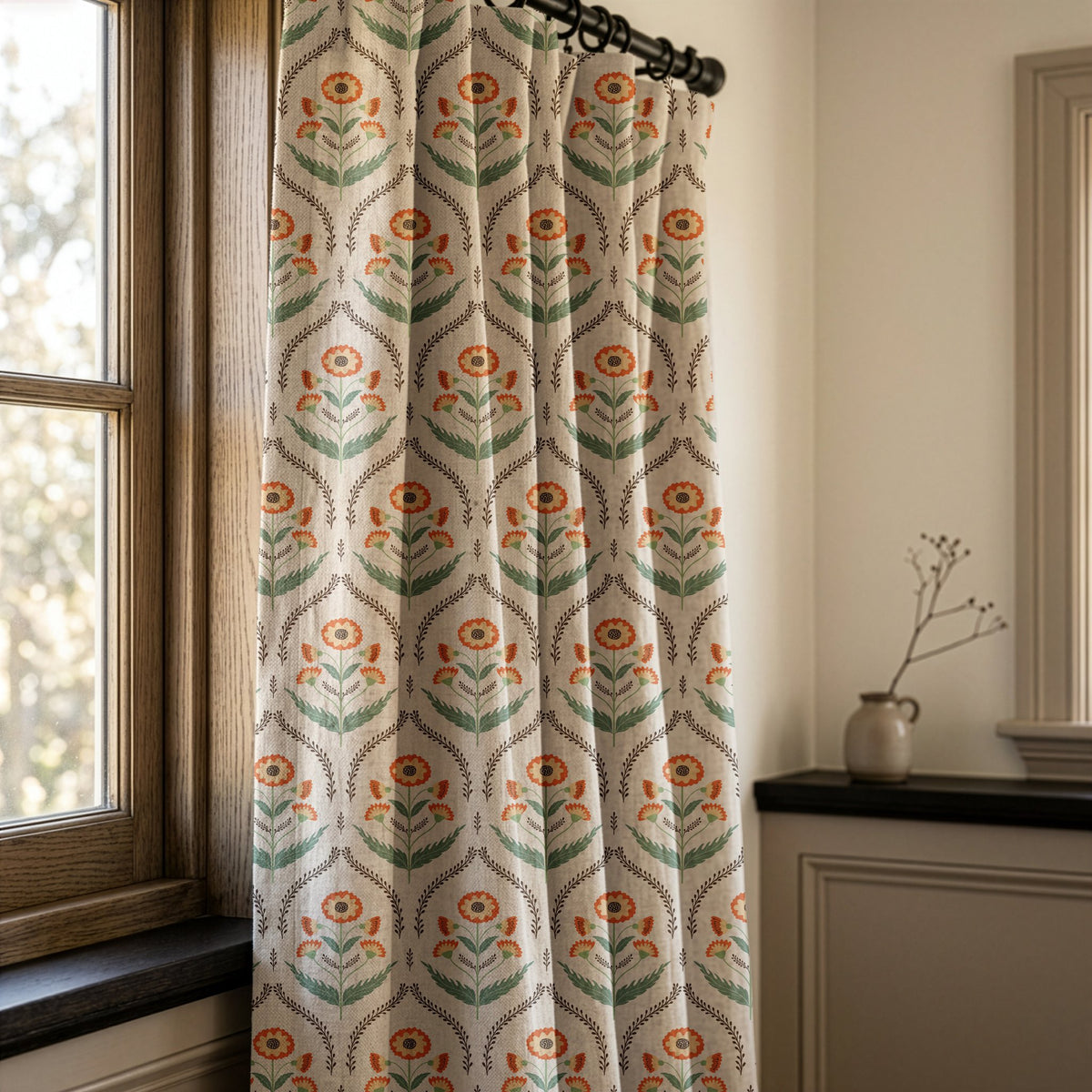 Orange ogee floral curtains in a warm living room