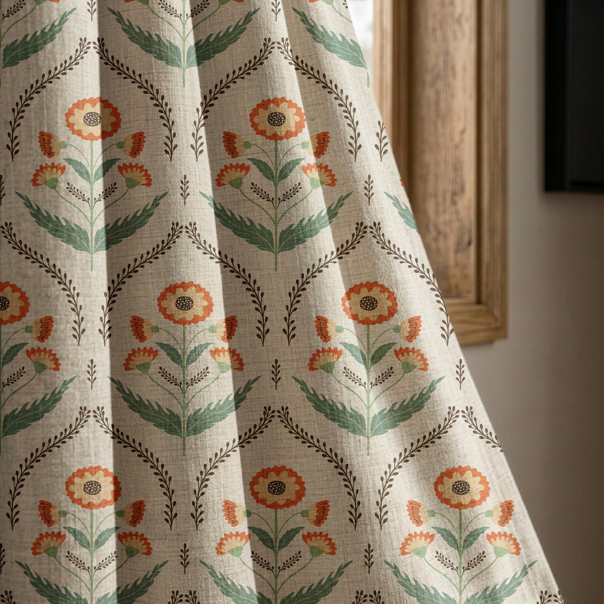 Orange ogee floral curtain panel beside a rustic wooden window