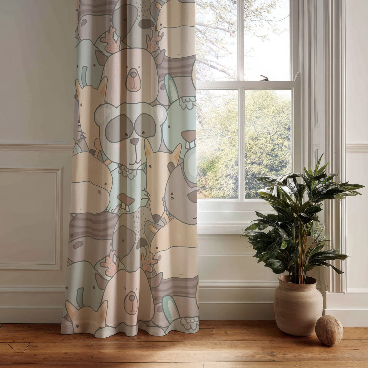 Pastel animal nursery curtain panel hanging by a white window