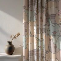 Soft daylight through a pastel animal nursery curtain