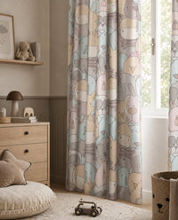 Pastel animal nursery curtains styled with neutral decor