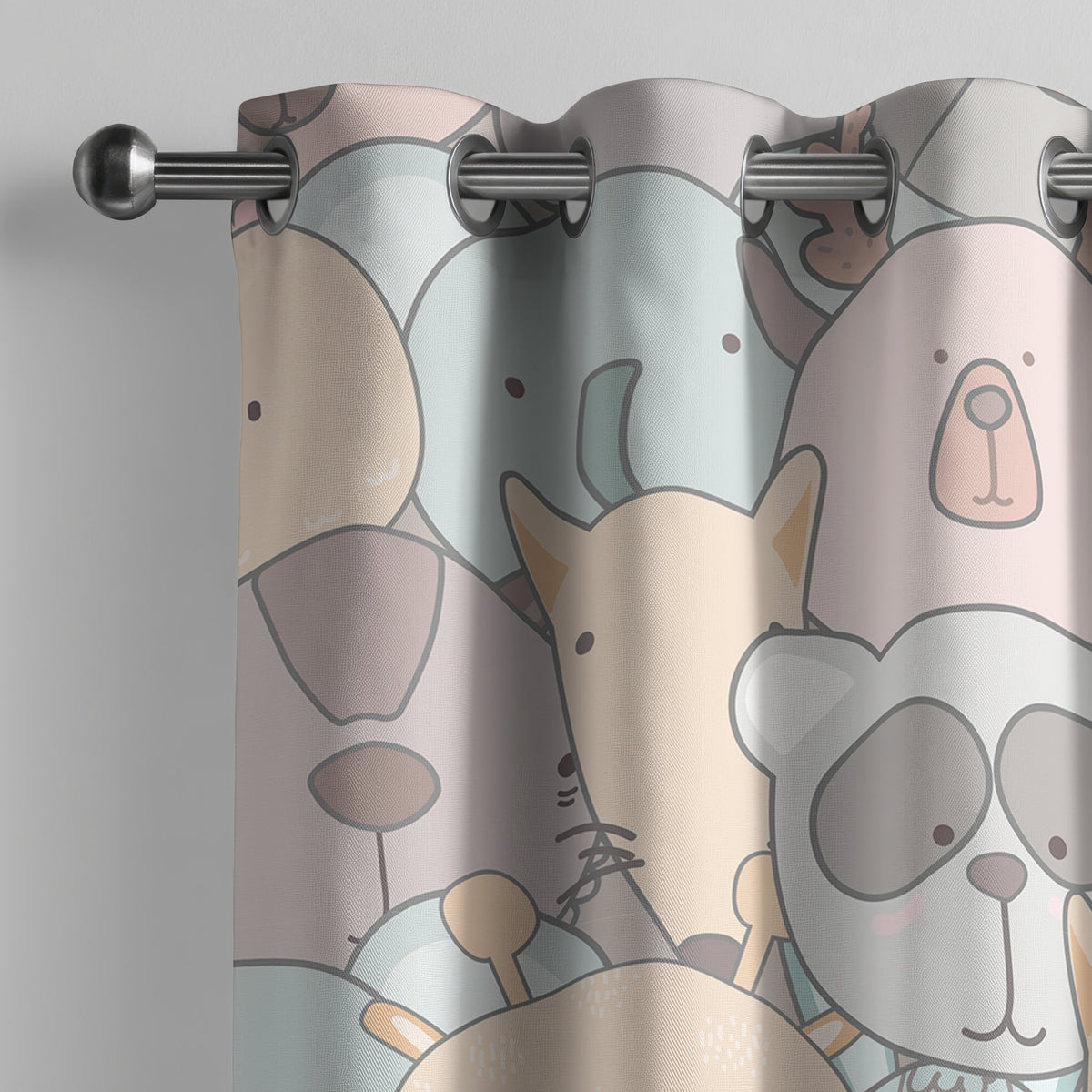 Pastel animal nursery curtain on a grommet rod, close-up of the print