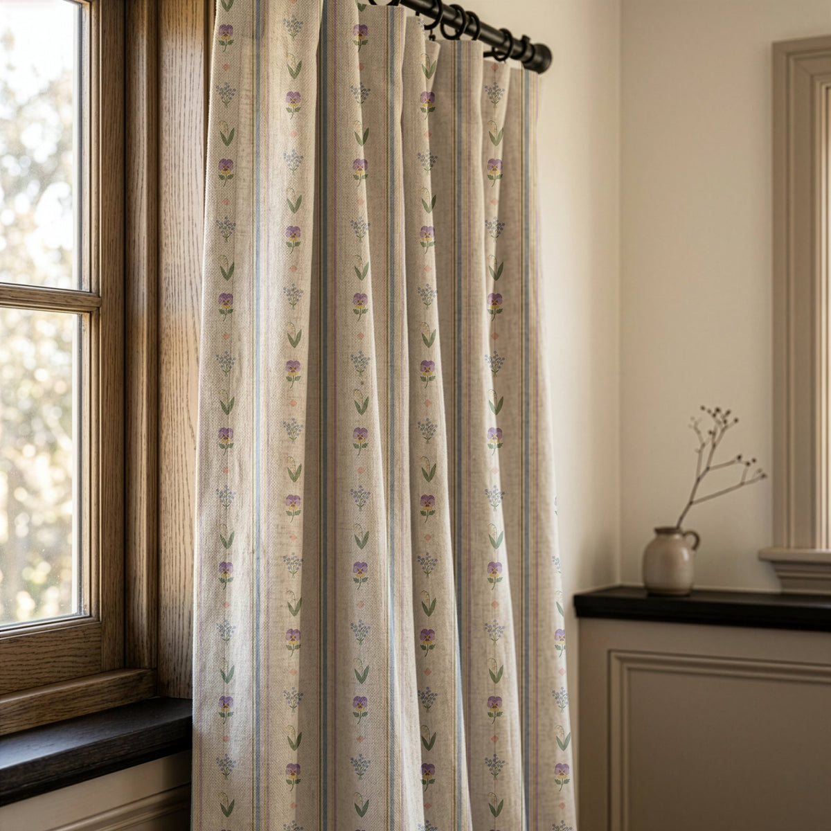 Pastel ditsy floral stripe curtains in a warm living room