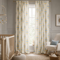Pastel kite nursery curtains in a child's bedroom