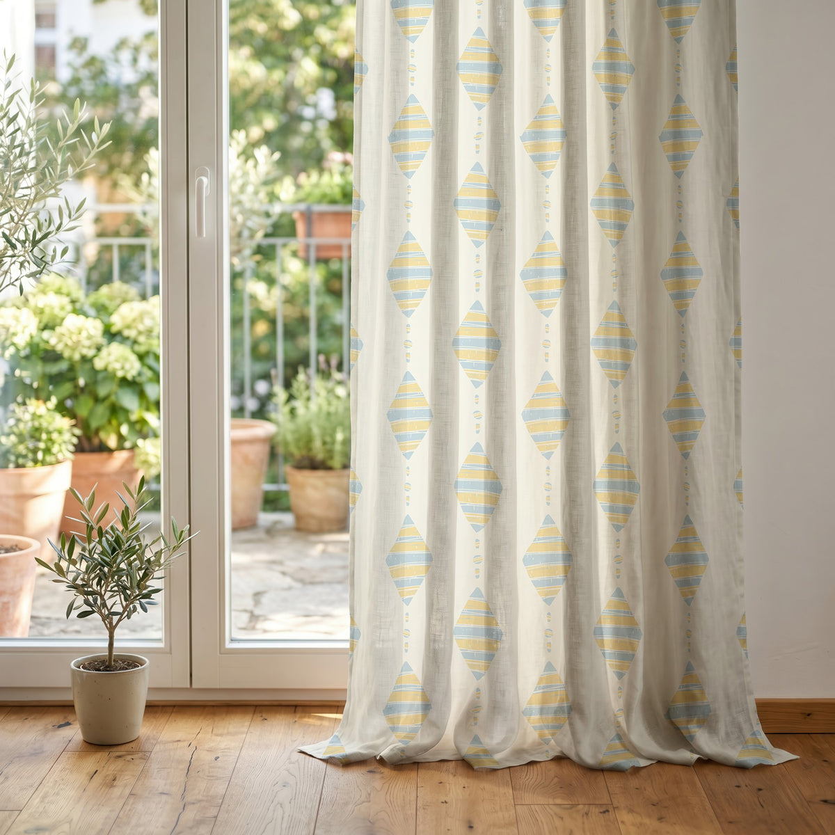Pastel kite nursery curtain at glass patio doors