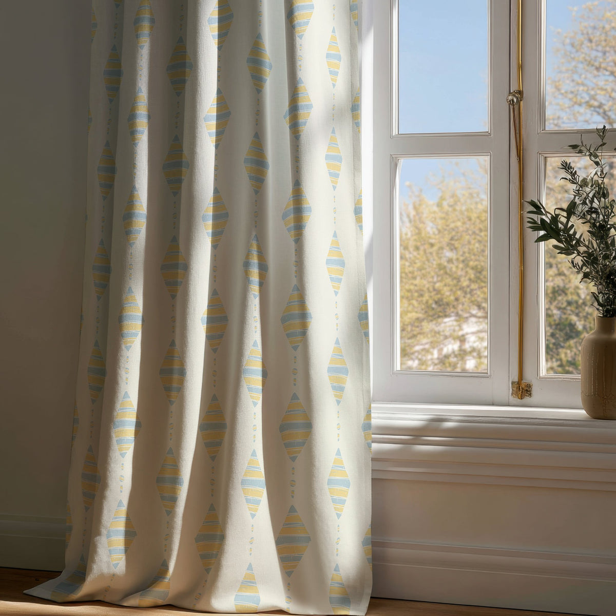 Full-length pastel kite nursery curtain draping to a wooden floor