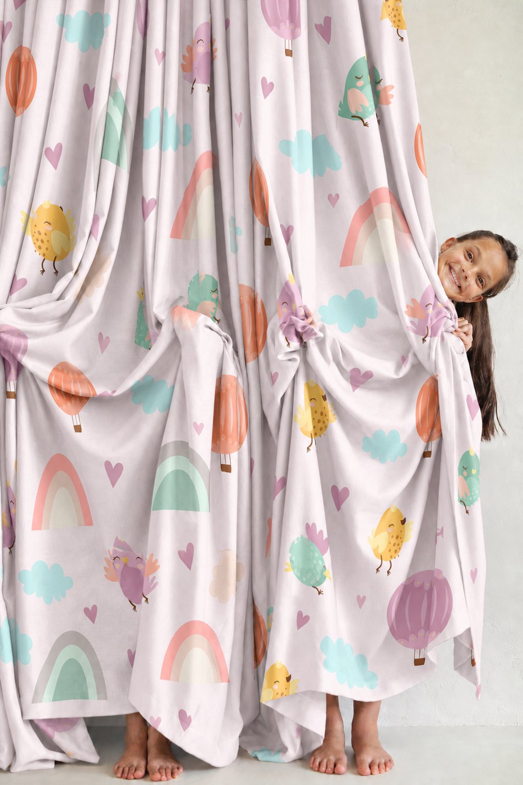Pastel rainbow kids curtains in a child's bedroom