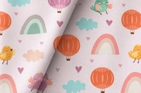Pastel rainbow kids curtains framing a tall window