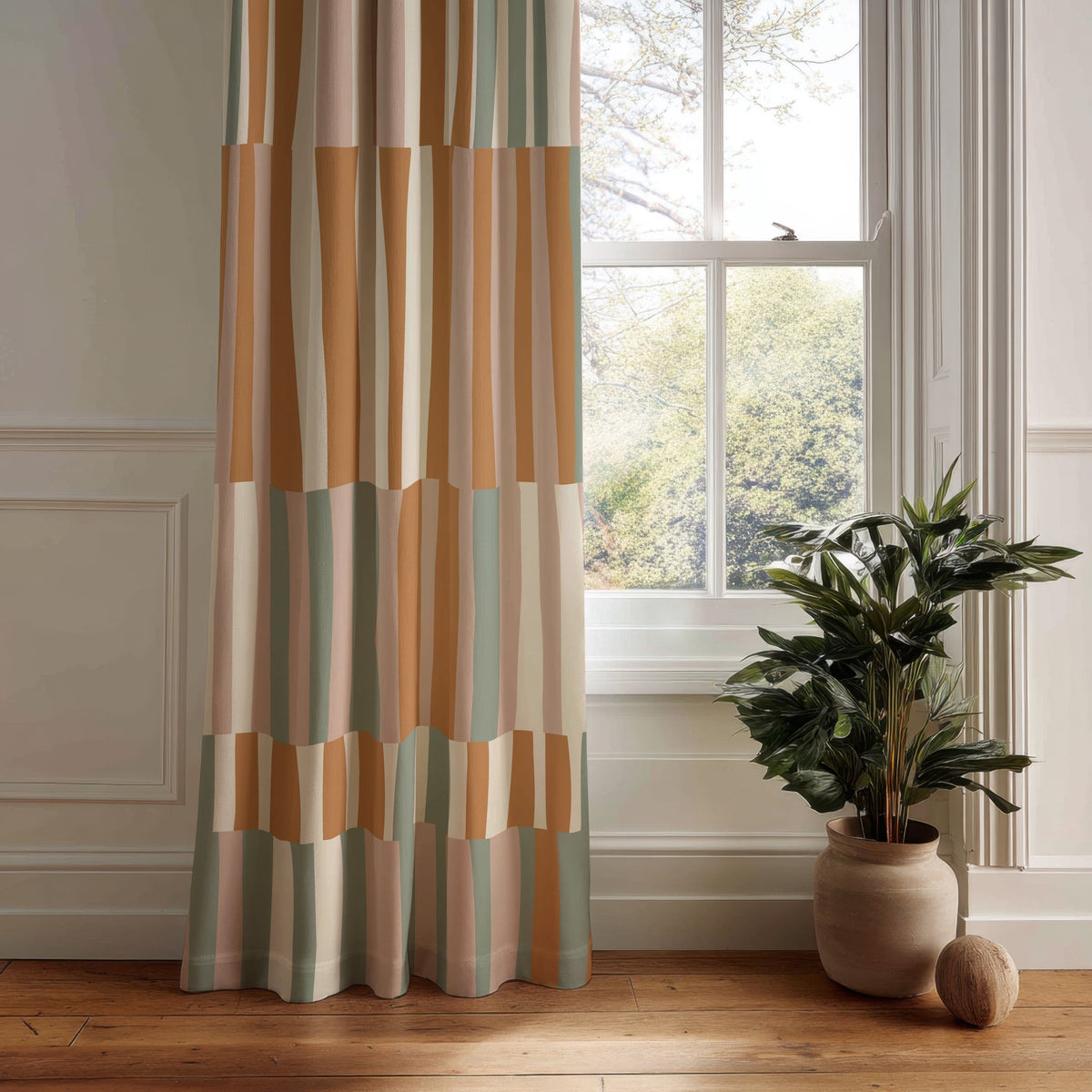 Patchwork color block curtain panel hanging by a white window