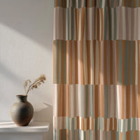 Soft daylight through a patchwork color block curtain