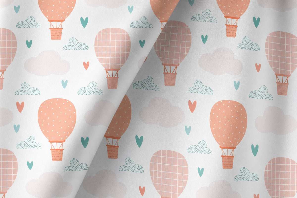 Peach hot air balloon nursery curtains framing a tall window