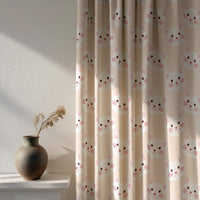 Soft daylight through a peach kitten kids curtain