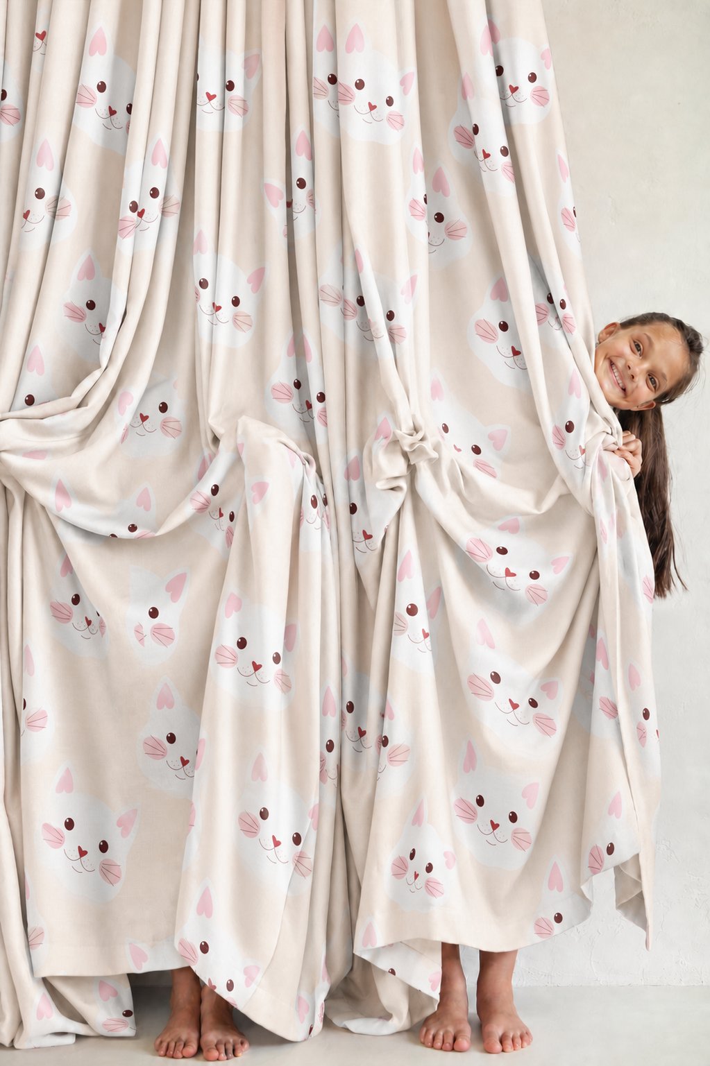 Pair of peach kitten kids curtains in a child's bedroom