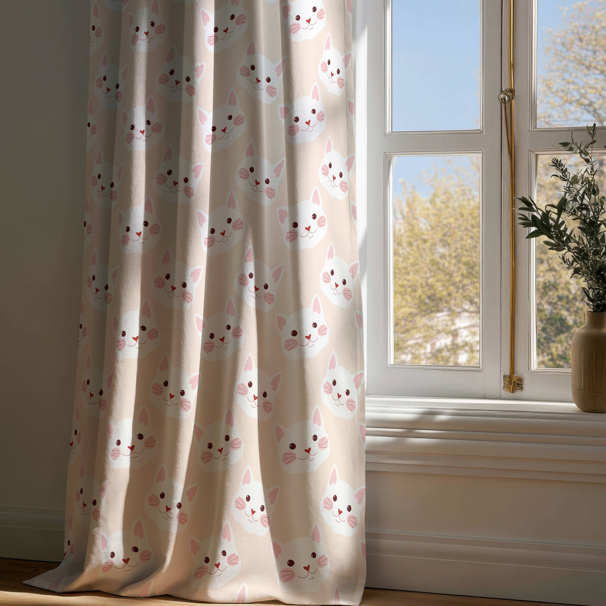 Full-length peach kitten kids curtain draping to a wooden floor