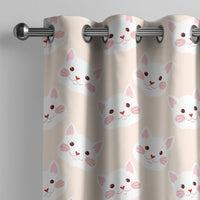 Peach kitten kids curtain on a grommet rod, close-up of the print