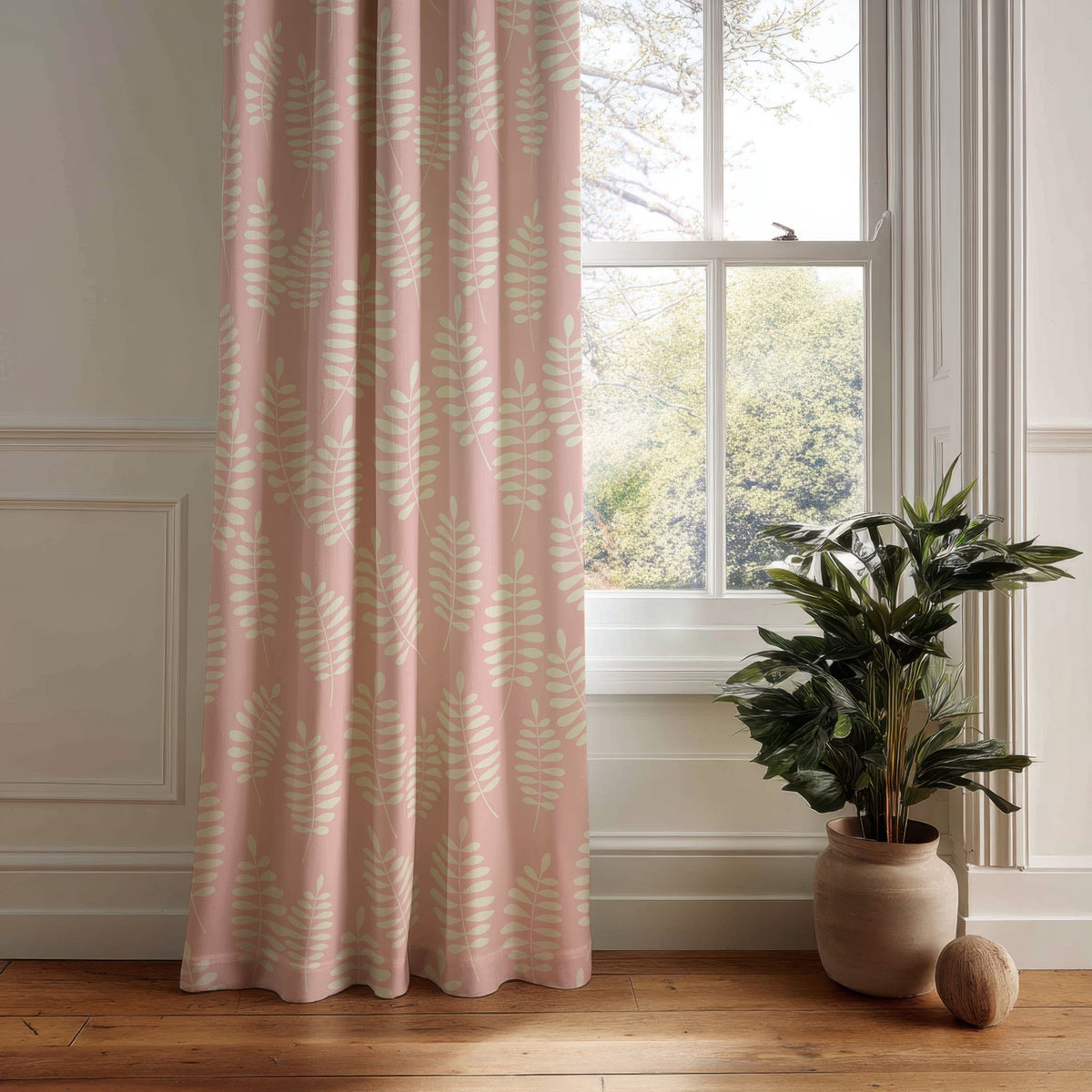 Pink fern leaf nursery curtain panel hanging by a white window