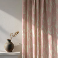 Soft daylight through a pink fern leaf nursery curtain