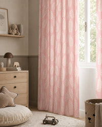 Pink fern leaf nursery curtains styled with neutral decor