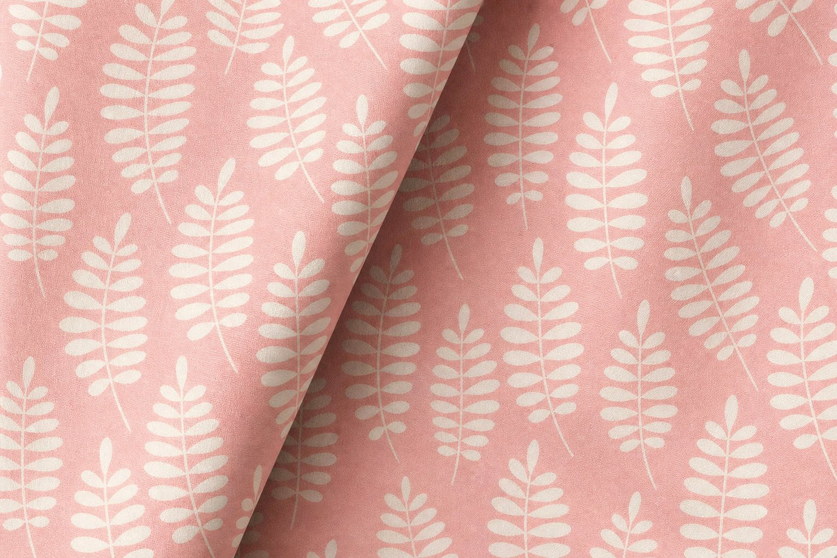 Pink fern leaf nursery curtains framing a tall window