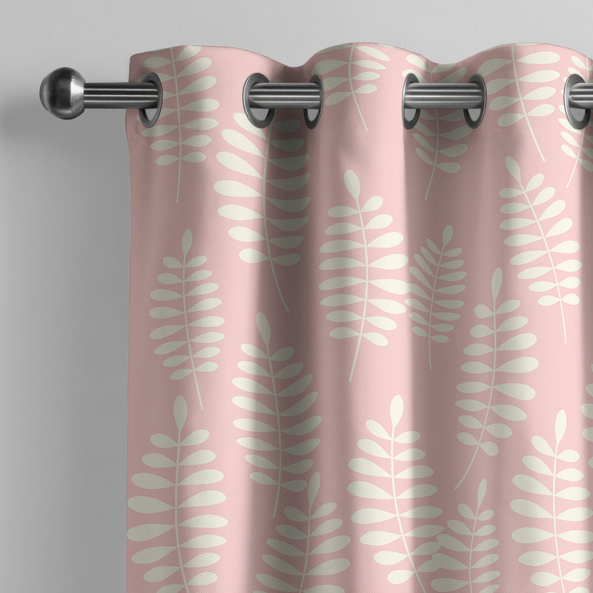 Pink fern leaf nursery curtain on a grommet rod, close-up of the print