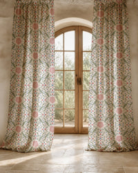 Two long pink folk medallion curtain panels