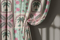 Pink and mint palm tile curtain gathered to one side