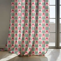 Pink retro tulip curtain panels by a sunny window