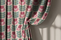 Pink retro tulip curtain gathered to one side