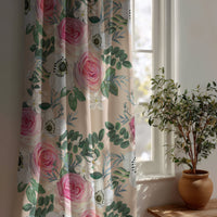 Pink rose floral curtain beside a potted olive tree