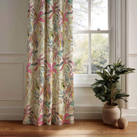 Pink tropical lily curtain panel hanging by a white window